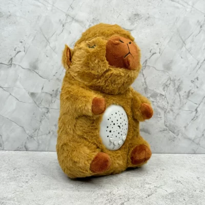 Peluche capibara proyector